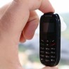 Mini telefon tip casca Bluetooth, Micro SIM card, ecran 0.66 inch, ambalaj deteriorat